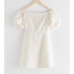 White off shoulder puff sleeve jacquard dress